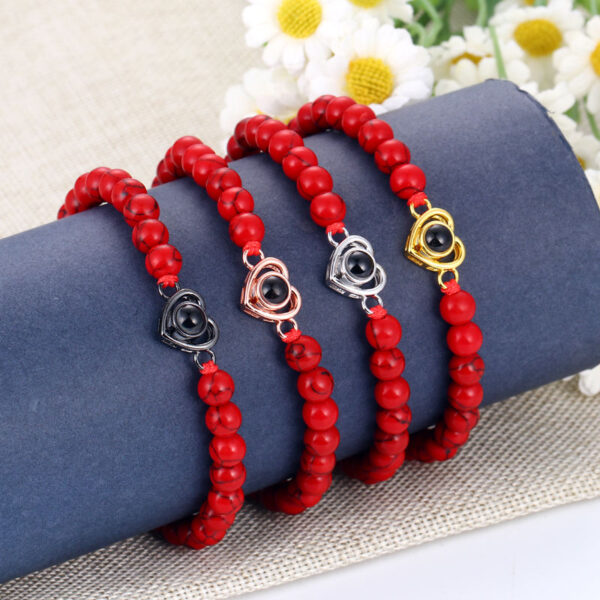 Pulsera de piedras con dije de corazón - Imagen 2